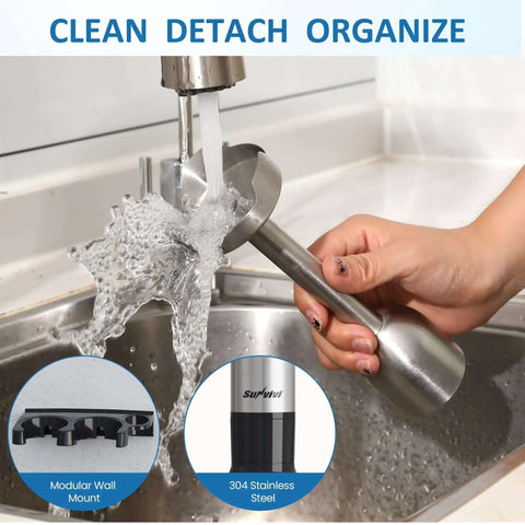 User washing Total Beast 1000W Hand Blender With 12 Speed Immersion Tool And Turbo Function in sink, showcasing stainless steel design.