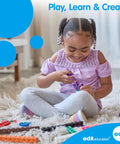 Child playing with Fruit Counters Set Of 108 Kid Approved Rubber Math Blocks For Toddlers 3 To 5 Preschool Sorting Toys on carpet.