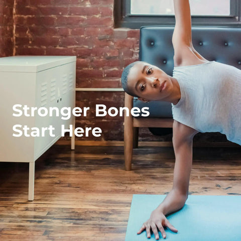 Person practicing yoga indoors to promote bone health, text 'Stronger Bones Start Here' on image with wooden floor and white cabinet.