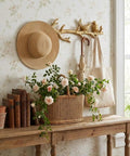 Vintage Cast Iron Bird Branch Wall Hook Dead Tough Rustic Coat Rack For Entryway Cottagecore Home Decor With Slick Gold Finish, displaying a straw hat and umbrella.
