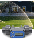 2 Inch Turbine Flow Meter With LCD Display For PVC Water Pipe in garden irrigation, showing front view with LCD panel visible.