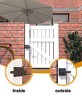 Heavy Duty Left Inswing Gate Latch Double Sided Self Locking With Built In Spring For Wooden Fences Pool Gates Backyard Gardens shown installed on a white gate.