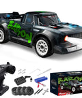 One Sixteen Scale 4WD RC Car With High Speed Drifting Up To Twenty MPH Off Road Buggy with lights, remote, and box contents.