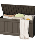 Heavy Duty 80 Gallon Outdoor Storage Box Top Shelf Resin Deck Crate with cushions and blanket inside, all weather storage.