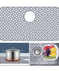Heat Resistant Silicone Sink Protector Mat With No Slip Grid Design For Kitchen Sinks, Rear Drain Access, Durable Silicone Mat, 26.4 Inch By 14.4 Inch, Easy Cleanup, Keeps Counter Dry with pot and fruit plate