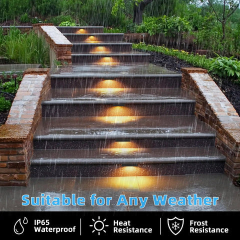 Outdoor steps illuminated by 12 Pack 7 Inch LED Hardscape Wall Lights for Outdoors, 5W Low Voltage, 2700K, IP65 Waterproof, in rain