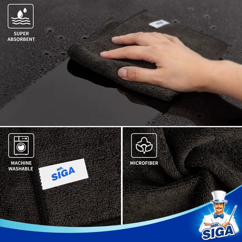 Hand using All Purpose Microfiber Cleaning Cloths Pack Of 12, Ultra Soft, Killer Streak Free And Scratch Free Rags, Absorbent Lint Free Towels For Windows, Kitchen, Cars, And More, 32 X 32 Cm, Black on surface