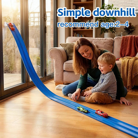 Mother and child playing with Portable Diy Roll Up Race Track for kids, showing blue track and diecast cars on living room floor.
