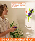 Child using remote with Rad Glow In The Dark Gecko Wall Climber Robot Toy on wall, showcasing realistic crawling action