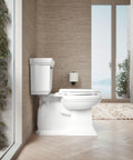 KOHLER Cachet elongated toilet in white with closed lid, installed in a modern bathroom.
