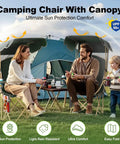 Couple sitting on Canopy Camping Chair Foldable With Sun Shade For Beach And Outdoors, olive green, tent in background