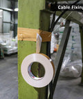 Tan Duct Tape 1 Inch By 60 Yards Heavy Duty Waterproof No Residue Tear By Hand 9 Mil Industrial Grade Strong Tape fixing cables on pole.