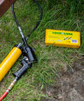 Lock-N-Lube grease fitting replacement kit in yellow case with SAE/metric zerks, multi-tools and caps