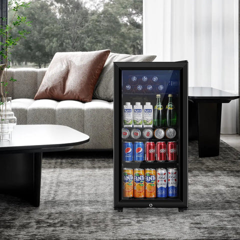 Small But Mighty Beverage Refrigerator With Double Glass Door, 3.2 Cu Ft Mini Fridge For Soda Beer Or Wine, in a living room