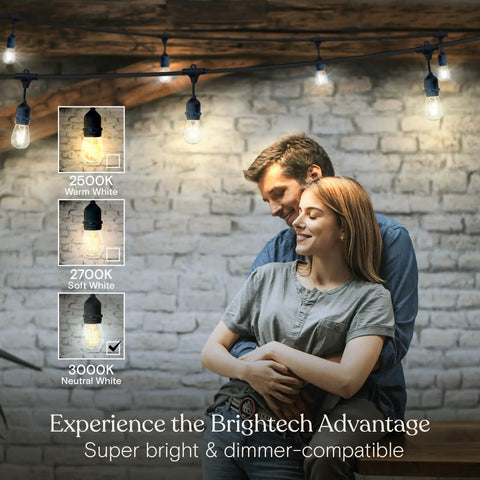 Couple hugging under Ambience Pro Waterproof LED Outdoor String Lights Hanging Dimmable 2W Vintage Edison Bulbs 48 Foot