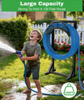 Heavy Duty Metal Garden Hose Holder And Hanger Freestanding Water Hose Storage Rack With Dual Tool Hooks in use by child.