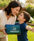 Mother and son smiling while holding Starter Bass Fishing Tackle Kit For Kids And Beginners With 75 Pieces No Junk Fillers Lures.