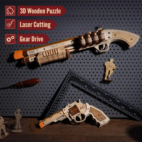 3D Wooden Puzzle Rubber Band Gun Kit For Adults And Teens Buildable Toy Shotgun Model, Challenging Wood Craft Project, Dope Hobby For Men And Women, Quick 1.5 Hour Assembly And Firing Action. wooden rubber band shotgun model on pegboard with extra parts