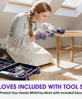Woman using General Household Tool Set For Women And DIYers With A Purple Hand Tool Kit And Waist Pouch And Gloves