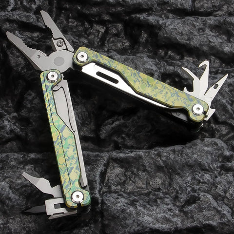 Ultra Lightweight Titanium Alloy Multitool Pliers With Camouflage Finish, 420 Stainless Steel Plier Head displayed on dark rock surface
