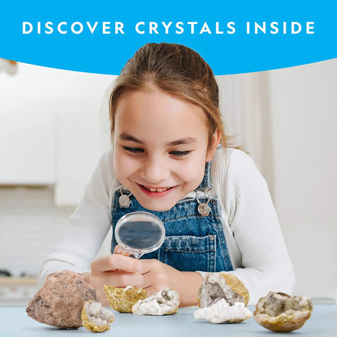 Child examining geode with magnifying glass from Hands On Geode Break Open Kit For Kids With 10 Premium Geodes And Crystal Treasures Inside.