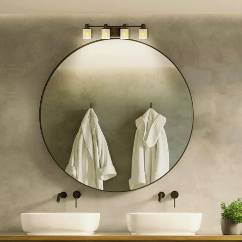 Norwood 4-Light Traditional Bath Fixture Wall Lamp in Bronze Finish over bathroom mirror and sinks