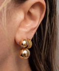 Gold Double Ball Drop Earrings For Women Round Ball Bead Dangle Studs Trendy Jewelry Must Have Hypoallergenic Lightweight Everyday Wear Gift Idea Classic Yet Modern Gold Tone Accessories on ear