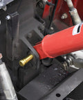 Close-up of red PTO driveline connected to gearbox on 3 Point Post Hole Digger For Tractors With 6 Inch Auger Fits Compact And Sub Compact Cat 0 Tractors Beefy Right Angle Gearbox PTO Driveline Safety Shields A Frame Lift Arm 21 Inch Spacing Hardware Kit Included.
