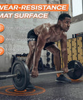 Athlete lifting weights on thick 0.56 inch interlocking gym flooring mats with rubber top for home gym use, installed view.
