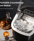 Countertop Ice Maker With Handle For Home Kitchen, Fast Bullet Ice Production, 26.5 Pounds Per Day, 9 Cubes In About 6 To 8 Minutes, Two Ice Size Options, Portable Self Cleaning Ice Machine with ice cubes in tray.