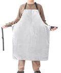 Badass Aluminized Heat Resistant Cover With Rock Solid Fireproof Safety Gear For Foundry Furnace Welding And Glass Blowing, model wearing reflective bib.