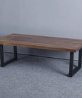 Rustic Industrial Square Tube Table Legs Set supporting a wood table top, 15.7 inch height by 17.7 inch width, in a room setting.