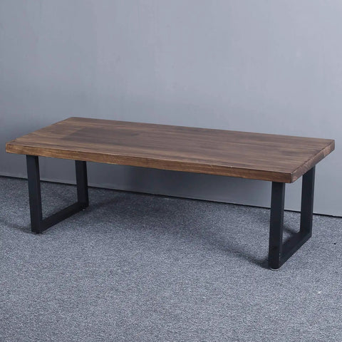 Rustic Industrial Square Tube Table Legs Set supporting a wood table top, 15.7 inch height by 17.7 inch width, in a room setting.