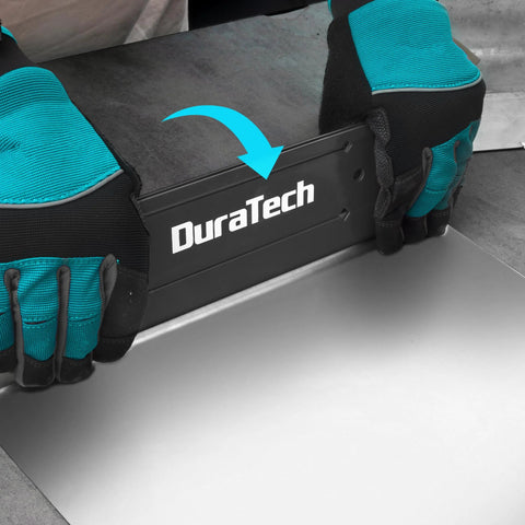 12 Inch Sheet Metal Bender For Duct Bending And Hand Seamer With Three Eighths Inch And One Inch Fold Depths For Precise HVAC Ducts And Metal Fabrication On The Job Site Built From Cold Rolled Carbon Steel For Pro Grade Strength Gray Duratech, shown in use with gloves.