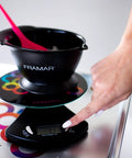 Person using Hair Color Scale For Salon And Kitchen Digital Scale For Hair Color Accurate 11 Lb Capacity With Five Hundredths Of An Ounce Increments Easy To Clean Pro Style For Stylists And Home Kitchens with bowl on top.
