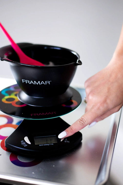 Person using Hair Color Scale For Salon And Kitchen Digital Scale For Hair Color Accurate 11 Lb Capacity With Five Hundredths Of An Ounce Increments Easy To Clean Pro Style For Stylists And Home Kitchens with bowl on top.