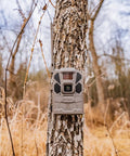 Hella Rugged Cellular LTE Trail Camera With Kick Ass Night Vision And Waterproof Build Designed For Slick Wildlife Tracking, mounted on tree.