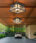 Adjustable Outdoor Motion Sensor Ceiling Light With Ten Inch Flush Mount Sleek Square Modern Industrial Design Two Light Clear Glass For Porch Garage Patio Hallway Entryway installed in a modern carport