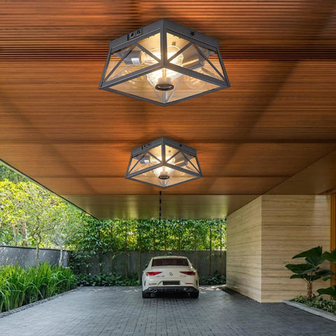 Adjustable Outdoor Motion Sensor Ceiling Light With Ten Inch Flush Mount Sleek Square Modern Industrial Design Two Light Clear Glass For Porch Garage Patio Hallway Entryway installed in a modern carport