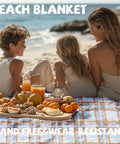 Family sitting on Oversized Picnic Blanket 80 By 80 Inches Waterproof And Sandproof For Beach Park Camp Ground Mat with food spread.