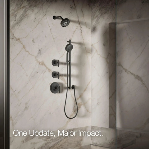 Purist Three Function Showerhead With Handheld 1.75 GPM Matte Black in marble bathroom setting.