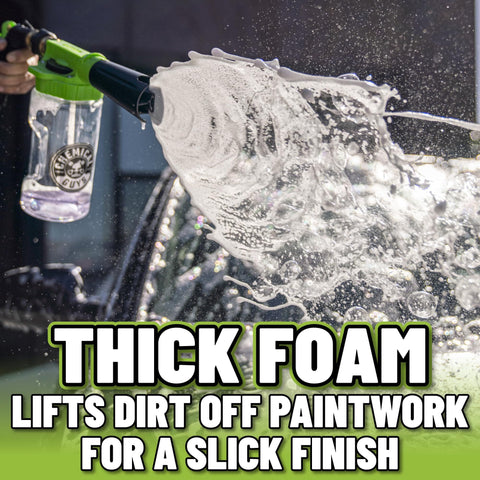 Foam Blaster 6 Car Wash Gun spraying thick suds from garden hose onto vehicle, enhancing cleaning for cars and trucks.