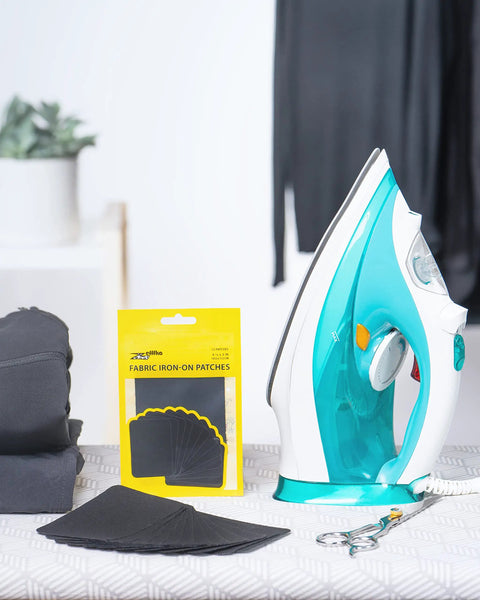 Heavy Duty Iron-On Patches Set 12 Black Fabric Repair Patches 3 By 4.25 Inches 100 Percent Cotton with iron on ironing board