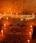 Bathtub surrounded by 48 Piece LED Floating Candles Flameless Waterproof Tealights For Weddings And Pool Parties Centerpieces Yellow Warm White Light Create Romantic Vibe And Dinner Ambiance Battery Powered Tealights For Bathtub.