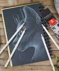 White Charcoal Pencils Set, 5 Piece For Dark Paper Sketching And Shading, used on black paper with cat sketch drawing.