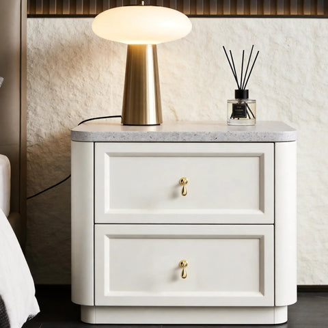 Top Shelf Heavy Duty Solid Brass Cabinet Knob Featuring Slick Brushed Gold Finish Smooth Glide Movement Great For Kitchen Cabinets Dresser Drawers Closet Doors And Vanity Cupboards Elegant Raindrop Pull Handle on white nightstand.