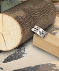 Six Piece Slab Clamping Dogs For Woodworking Tools with hold down clamps securing a log, stainless steel, precise grip