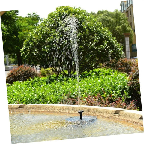 1.6W Solar Powered Pump Kit For Outdoor Water Features And Floating Fountains in garden setting