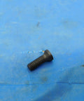 Premium S1073 Screw Indexable Insert For CNC Machining And Heavy Duty Metalworking on a blue background.