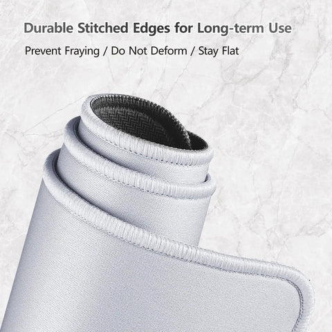 Close-up of rolled white sublimation blank mouse pad showing stitched edges, 10 pack with non slip rubber base for heat press transfer.